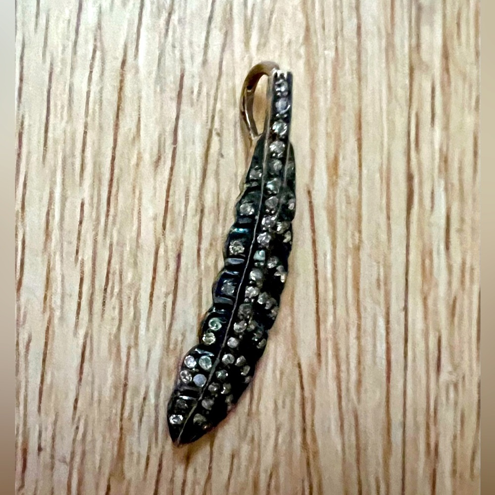 Oxidized Silver with Pavé Diamonds feather pendant.